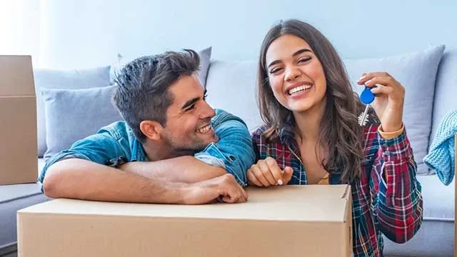 Couple packing boxes